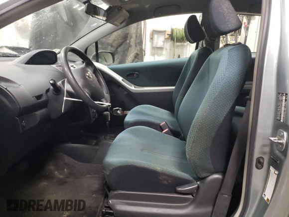 2007 Toyota Yaris with VIN JTDJT923275114473, listed as a Copart auction lot 52242355 with 137,963 mi miles and Salvage Title. Bid and sale history available at carsss.com. Image 7.