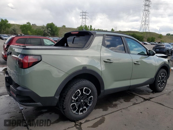 2022 Hyundai Santa Cruz SEL Premium z VIN 5NTJDDAF5NH016841, wystawiony jako Copart lot #58422695 z przebiegiem 27 287 mil mil oraz Szkoda całkowita • Salvage title. Historia ofert i sprzedaży dostępna na DreamBid. Obrazek 3.
