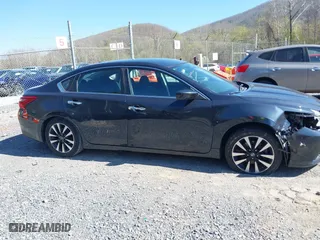 2018 Nissan Altima 2.5 SR with VIN 1N4AL3AP8JC179774, listed as a IAAI auction lot 41933926 with 131,506 mi miles. Bid and sale history available at carsss.com. Image 13.
