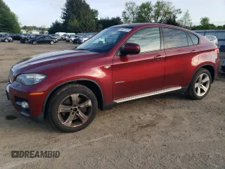 2012 BMW X6 50i z VIN 5UXFG8C50CLZ97160, wystawiony jako Copart lot #55077875 z przebiegiem 174 934 mil mil oraz Czysty tytuł • Clean title. Historia ofert i sprzedaży dostępna na DreamBid. Obrazek 1.