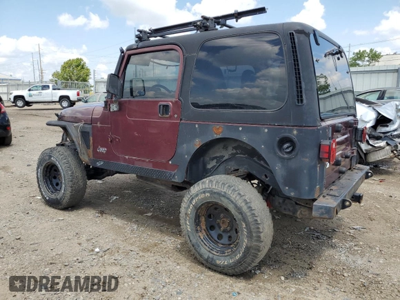 2002 Jeep Wrangler X with VIN 1J4FA39SX2P732881, listed as a Copart auction lot 64451185 with Not provided miles and Clean title. Bid and sale history available at DreamBid. Image 2.