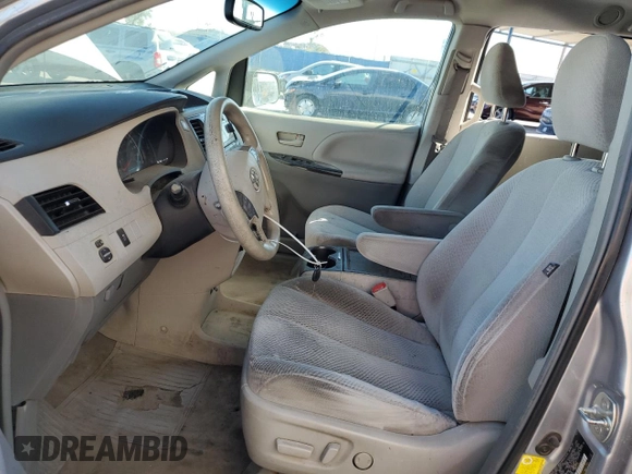 2012 Toyota Sienna LE AAS with VIN 5TDKK3DC8CS259085, listed as a Copart auction lot 73592584 with 198,370 mi miles and Salvage Title. Bid and sale history available at DreamBid. Image 7.