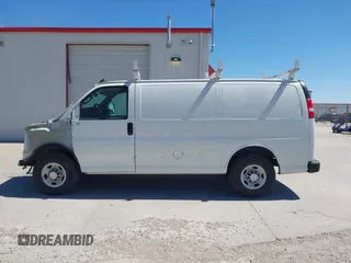 2018 Chevrolet Express Cargo Van with VIN 1GCWGAFP6J1332570, listed as a IAAI auction lot 41482103 with 142,405 mi miles. Bid and sale history available at carsss.com. Image 14.