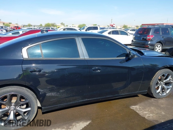 2015 Dodge Charger SXT z VIN 2C3CDXHG5FH784907, wystawiony jako IAAI lot #42322979 z przebiegiem 73 485 mil mil oraz . Historia ofert i sprzedaży dostępna na DreamBid. Obrazek 13.