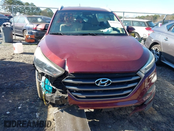 2016 Hyundai Tucson Sport with VIN KM8J33A22GU194476, listed as a IAAI auction lot 41201514 with 41,601 mi miles. Bid and sale history available at carsss.com. Image 11.