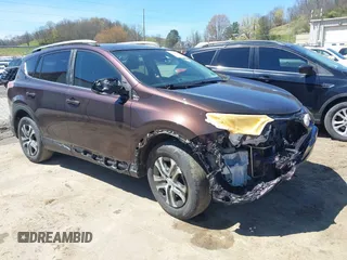 2017 Toyota RAV4 LE with VIN 2T3BFREV1HW566109, listed as a IAAI auction lot 42060202 with 134,488 mi miles and . Bid and sale history available at DreamBid. Image 1.