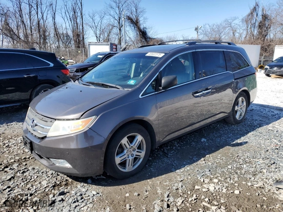 2013 Honda Odyssey Touring with VIN 5FNRL5H90DB028659, listed as a Copart auction lot 46602375 with 285,366 mi miles and Clean Title. Bid and sale history available at carsss.com. Image 1.