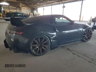 2009 Nissan 370Z z VIN JN1AZ44E19M411715, wystawiony jako Copart lot #56654815 z przebiegiem 123 791 mil mil oraz Szkoda całkowita • Salvage title. Historia ofert i sprzedaży dostępna na DreamBid. Obrazek 3.