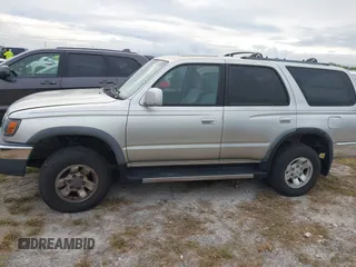 2000 Toyota 4Runner SR5 with VIN JT3GN86R0Y0159931, listed as a IAAI auction lot 40493131 with 200,277 mi miles and . Bid and sale history available at DreamBid. Image 14.