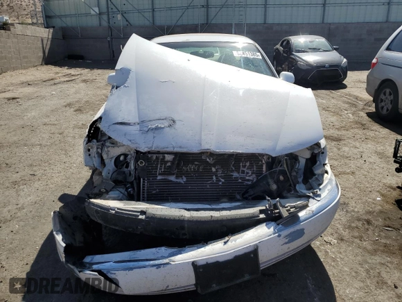 2001 Lincoln Continental z VIN 1LNHM97V31Y673523, wystawiony jako Copart lot #52451385 z przebiegiem 133 879 mil mil oraz Szkoda całkowita • Salvage title. Historia ofert i sprzedaży dostępna na DreamBid. Obrazek 5.