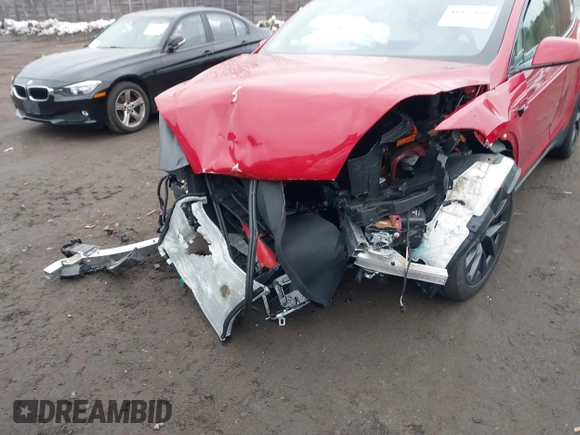 2022 Tesla Model X with VIN 7SAXCBE57NF354843, listed as a IAAI auction lot 41027188 with Not Provided miles and . Bid and sale history available at DreamBid. Image 6.