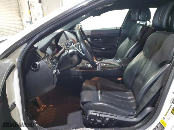 2015 BMW 6 Series 650i xDrive with VIN WBA6B4C56FD761374, listed as a Copart auction lot 41599334 with 63,057 mi miles and Salvage Title. Bid and sale history available at carsss.com. Image 7.