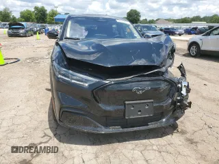 2023 Ford Mustang Mach-E Premium z VIN 3FMTK3SU9PMA83455, wystawiony jako Copart lot #64945095 z przebiegiem 52 540 mil mil oraz Czysty tytuł • Clean title. Historia ofert i sprzedaży dostępna na DreamBid. Obrazek 5.