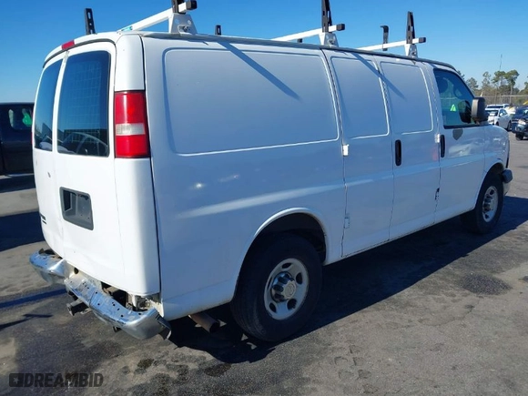 2012 Chevrolet Express Cargo Van with VIN 1GCWGFCA7C1100284, listed as a IAAI auction lot 41327810 with 211,077 mi miles. Bid and sale history available at carsss.com. Image 4.