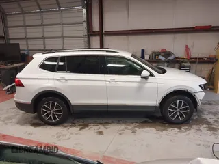 2020 Volkswagen Tiguan SE with VIN 3VV3B7AX4LM141023, listed as a IAAI auction lot 41521923 with 69,479 mi miles and . Bid and sale history available at DreamBid. Image 14.