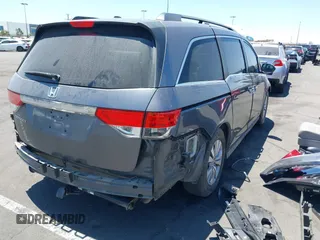 2014 Honda Odyssey EX-L z VIN 5FNRL5H61EB041962, wystawiony jako IAAI lot #42282873 z przebiegiem 134 884 mil mil oraz . Historia ofert i sprzedaży dostępna na DreamBid. Obrazek 4.