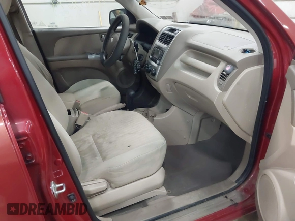 2009 Kia Sportage LX with VIN KNDJE723497555026, listed as a IAAI auction lot 42102679 with 136,398 mi miles. Bid and sale history available at carsss.com. Image 5.