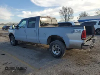 2001 Ford Super Duty F-250 XL with VIN 1FTNW21S11EB85907, listed as a Copart auction lot 82637054 with 159,489 mi miles and Salvage Title. Bid and sale history available at carsss.com. Image 2.