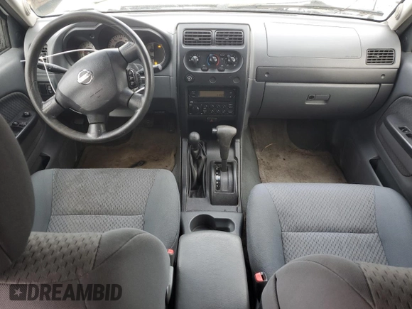 2004 Nissan Xterra XE z VIN 5N1ED28Y94C650106, wystawiony jako Copart lot #86811994 z przebiegiem 89 454 mil mil oraz Szkody całkowita. Historia ofert i sprzedaży dostępna na DreamBid. Obrazek 8.