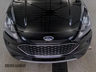 2021 Ford Escape SE with VIN 1FMCU9G64MUA42925, listed as a IAAI auction lot 42858756 with 79,685 mi miles and . Bid and sale history available at DreamBid. Image 27.