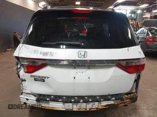 2013 Honda Odyssey EX-L with VIN 5FNRL5H66DB071151, listed as a IAAI auction lot 41914345 with 194,804 mi miles and . Bid and sale history available at carsss.com. Image 16.