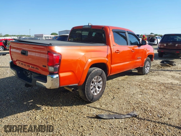2018 Toyota Tacoma SR5 with VIN 5TFAZ5CN2JX069067, listed as a IAAI auction lot 41975459 with 92,434 mi miles and . Bid and sale history available at DreamBid. Image 4.