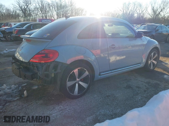 2014 Volkswagen Beetle Turbo R-Line with VIN 3VWVT7AT9EM661347, listed as a IAAI auction lot 41336295 with 61,068 mi miles and . Bid and sale history available at DreamBid. Image 4.