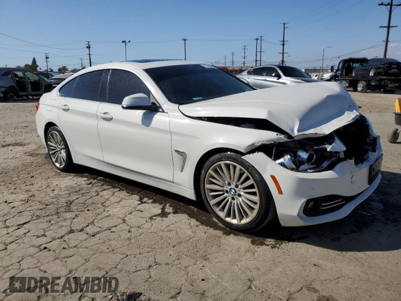 2015 BMW 4 Series 428i with VIN WBA4A9C58FGL85220, listed as a Copart auction lot 57128265 with 115,257 mi miles and Salvage title. Bid and sale history available at DreamBid. Image 4.