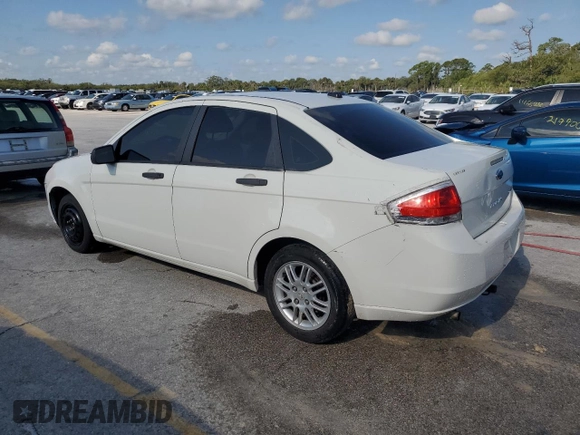 2010 Ford Focus SE with VIN 1FAHP3FN1AW168723, listed as a Copart auction lot 53871655 with 226,703 mi miles and Salvage Title. Bid and sale history available at DreamBid. Image 2.