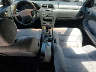 1998 Nissan Maxima GXE с VIN JN1CA21D0WT525657, выставлен на аукционе Copart как лот 57055485 с пробегом Не указан миль и Списание • Salvage title. История ставок и продаж доступна на DreamBid. Изображение 8.