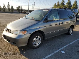 2000 Honda Odyssey EX z VIN 2HKRL1871YH603608, wystawiony jako Copart lot #46538095 z przebiegiem 187 968 mil mil oraz Szkoda całkowita • Salvage title. Historia ofert i sprzedaży dostępna na DreamBid. Obrazek 1.