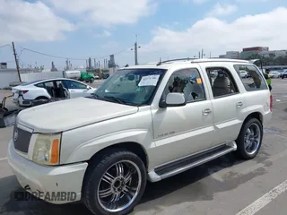 2003 Cadillac Escalade z VIN 1GYEK63N93R319255, wystawiony jako IAAI lot #42371706 z przebiegiem 171 656 mil mil oraz . Historia ofert i sprzedaży dostępna na DreamBid. Obrazek 6.