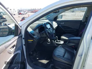 2017 Hyundai Santa Fe 2.4L z VIN 5NMZU3LB1HH045714, wystawiony jako IAAI lot #41949139 z przebiegiem 151 799 mil mil oraz . Historia ofert i sprzedaży dostępna na DreamBid. Obrazek 5.