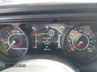 2024 Jeep Wrangler Sport S with VIN 1C4PJXDN2RW351741, listed as a IAAI auction lot 42122651 with 4,241 mi miles and . Bid and sale history available at DreamBid. Image 7.