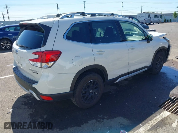 2022 Subaru Forester Touring with VIN JF2SKARC9NH445126, listed as a IAAI auction lot 42350111 with 61,998 mi miles and . Bid and sale history available at DreamBid. Image 4.
