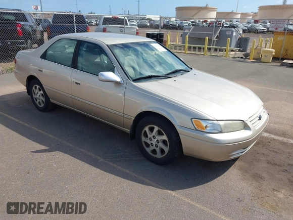 1999 Toyota Camry LE z VIN JT2BF22K9X0222119, wystawiony jako IAAI lot #41529258 z przebiegiem 119 919 mil mil oraz . Historia ofert i sprzedaży dostępna na DreamBid. Obrazek 1.