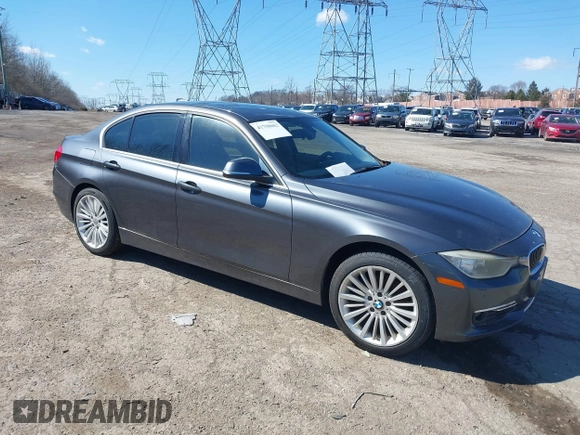 2012 BMW 3 Series 328i with VIN WBA3A5C53CF256338, listed as a IAAI auction lot 41758662 with 99,607 mi miles. Bid and sale history available at carsss.com. Image 1.
