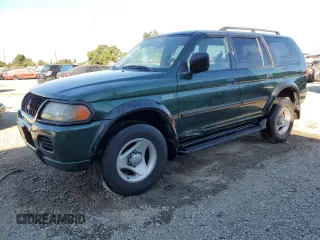 2001 Mitsubishi Montero ES z VIN JA4LS21H01P043215, wystawiony jako Copart lot #77391904 z przebiegiem 148 705 mil mil oraz Tytuł czysty. Historia ofert i sprzedaży dostępna na DreamBid. Obrazek 1.