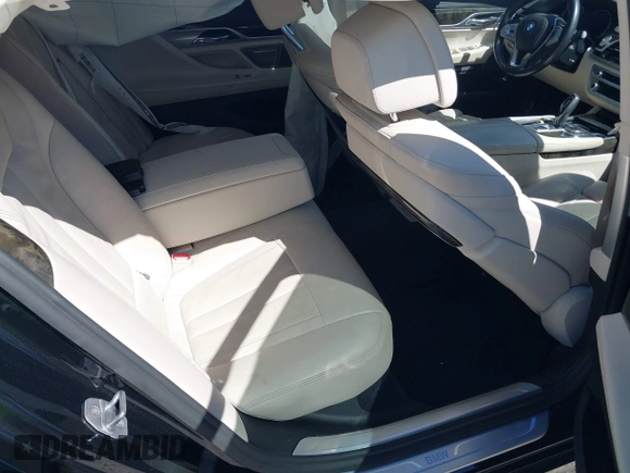 2018 BMW 7 Series 750i with VIN WBA7F0C54JGM22900, listed as a IAAI auction lot 41673673 with 66,264 mi miles. Bid and sale history available at carsss.com. Image 8.