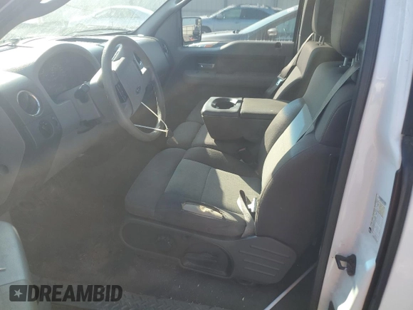 2005 Ford F-150 STX с VIN 1FTRX12W95FB70047, выставлен на аукционе Copart как лот 59154365 с пробегом 209 721 миль миль и Списание • Salvage title. История ставок и продаж доступна на DreamBid. Изображение 7.