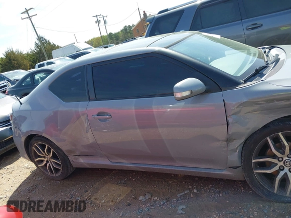 2014 Scion tC with VIN JTKJF5C78E3075164, listed as a IAAI auction lot 41922609 with 142,064 mi miles. Bid and sale history available at carsss.com. Image 14.