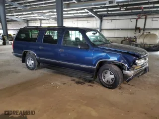 1999 Chevrolet Suburban with VIN 3GNEC16R5XG218523, listed as a Copart auction lot 72568494 with 297,020 mi miles and Salvage Title. Bid and sale history available at carsss.com. Image 4.