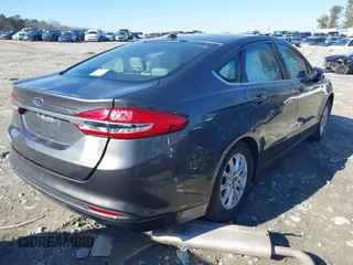 2017 Ford Fusion S with VIN 3FA6P0G78HR369523, listed as a IAAI auction lot 41267657 with 127,628 mi miles. Bid and sale history available at carsss.com. Image 4.