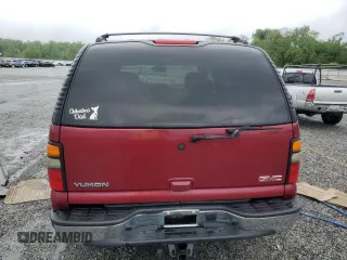 2005 GMC Yukon SLT z VIN 1GKEK13T65J115199, wystawiony jako Copart lot #56043835 z przebiegiem 245 988 mil mil oraz Szkoda całkowita • Salvage title. Historia ofert i sprzedaży dostępna na DreamBid. Obrazek 6.