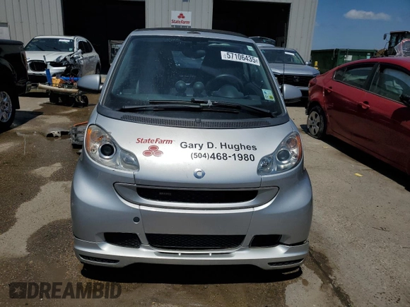 2009 Smart fortwo Passion z VIN WMEEK31X59K222243, wystawiony jako Copart lot #57106435 z przebiegiem 58 556 mil mil oraz Szkody całkowita. Historia ofert i sprzedaży dostępna na DreamBid. Obrazek 5.