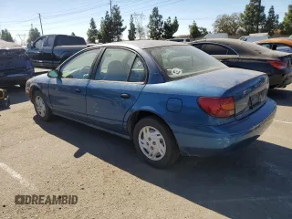 2001 Saturn SL z VIN 1G8ZF52861Z275529, wystawiony jako Copart lot #74153154 z przebiegiem 171 272 mil mil oraz Tytuł czysty. Historia ofert i sprzedaży dostępna na DreamBid. Obrazek 2.