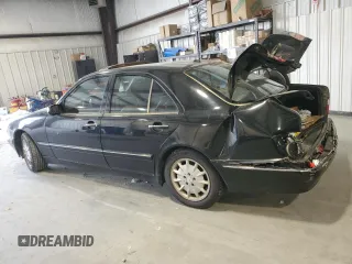 2001 Mercedes-Benz E 320 z VIN WDBJF65J91B339674, wystawiony jako Copart lot #50374725 z przebiegiem 205 940 mil mil oraz Szkoda całkowita • Salvage title. Historia ofert i sprzedaży dostępna na DreamBid. Obrazek 2.