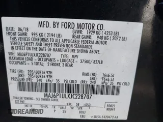 2018 Ford EcoSport SE with VIN MAJ6P1ULXJC228707, listed as a IAAI auction lot 41630469 with 91,070 mi miles. Bid and sale history available at carsss.com. Image 9.