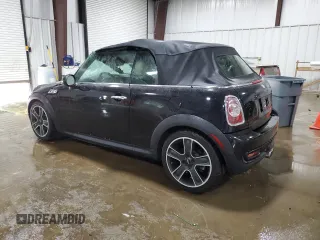 2013 MINI Convertible S with VIN WMWZP3C51DT297891, listed as a Copart auction lot 56745065 with 101,292 mi miles and Salvage title. Bid and sale history available at DreamBid. Image 2.