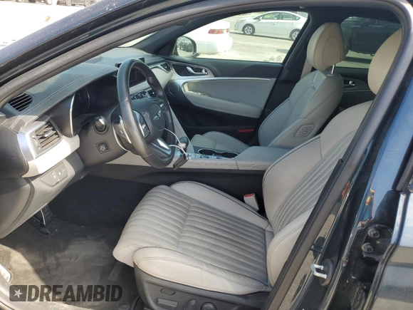 2022 Genesis G70 3.3T with VIN KMTG54TE2NU082023, listed as a Copart auction lot 74774034 with 17,411 mi miles and Salvage Title. Bid and sale history available at carsss.com. Image 7.